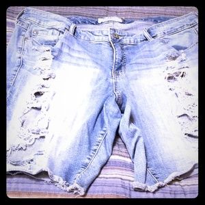 Torn jean shorts